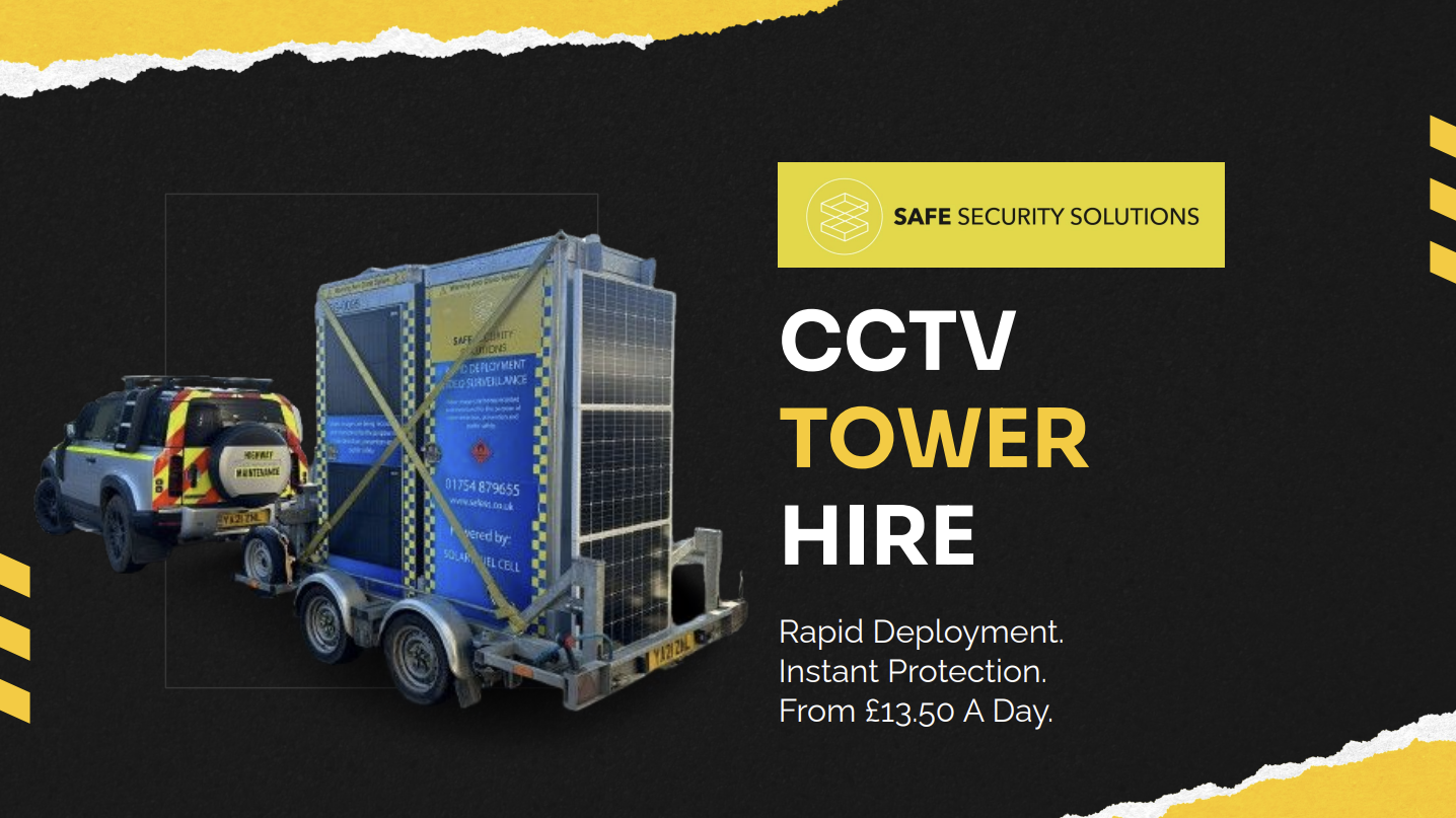 Two mobile CCTV towers on the back of a trailer, being towed to their location.