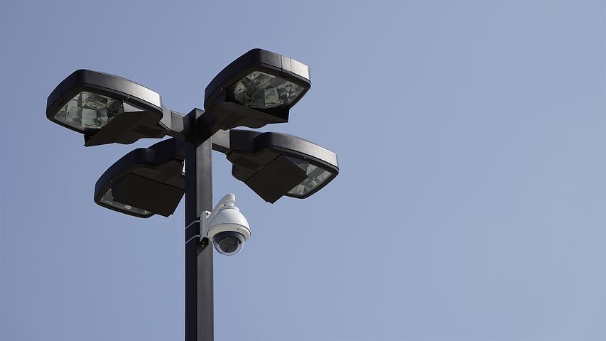 A lamp post with 4 lights and a PTZ camera mounted the post.