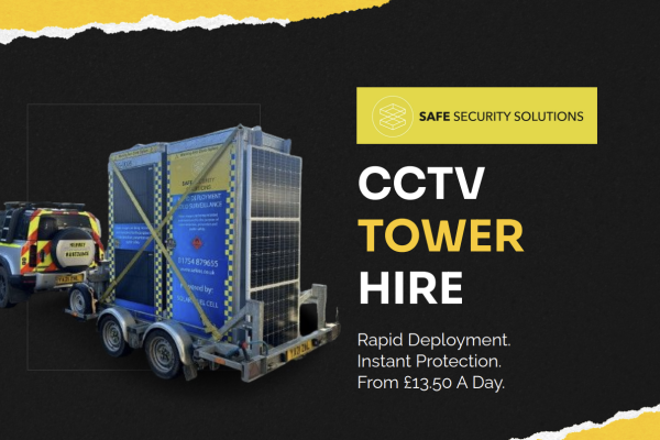 Two mobile CCTV towers on the back of a trailer, being towed to their location.